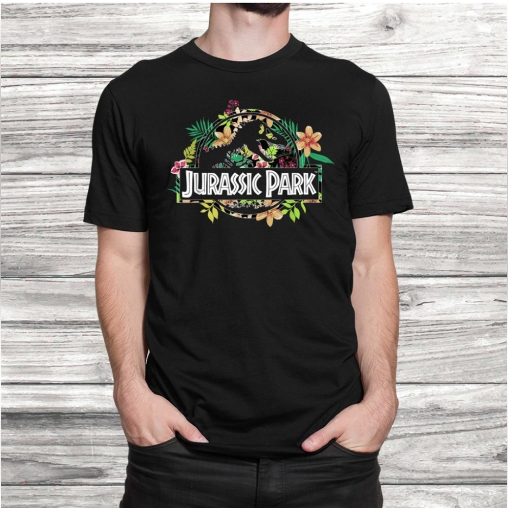 Univeral Studios Jurassic Park Floral Tropical T Rex Fossil Logo Tshirt. NWOT